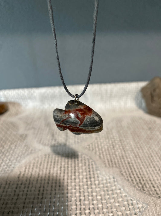 Hand shaped fish stone