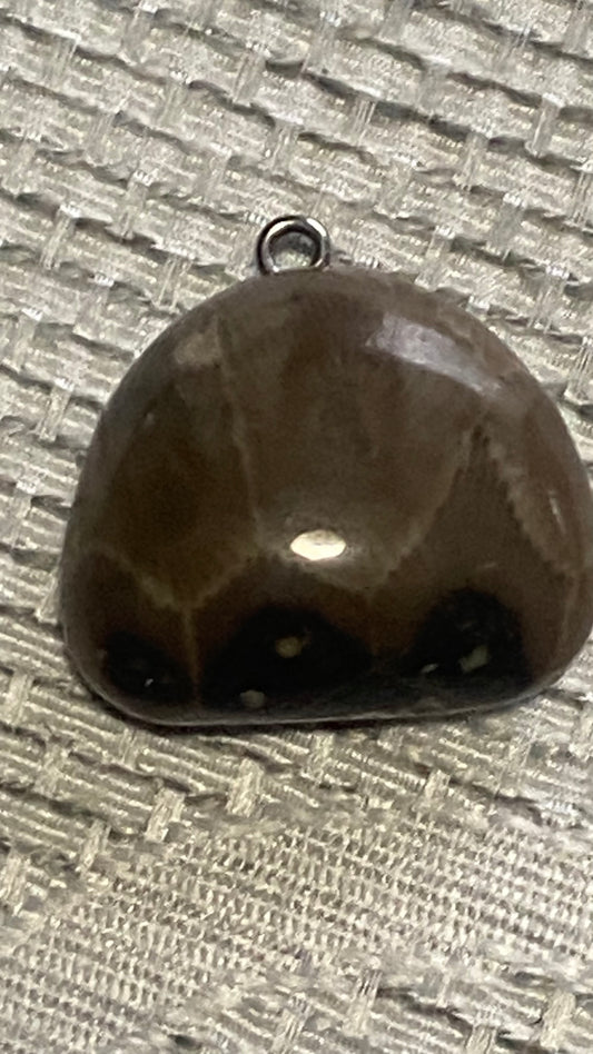 Hand shaped stone pendant or charm