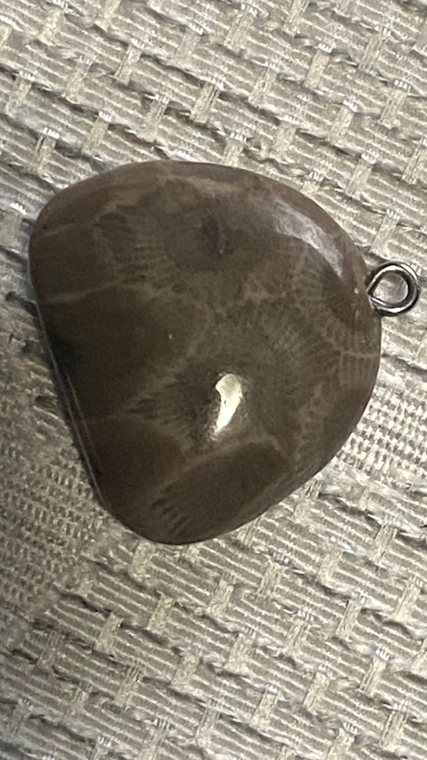 Hand shaped stone pendant or charm
